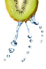 Image showing fresh water drops on kiwi isolated on white