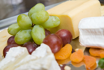 Image showing appetizer from cheese and grape