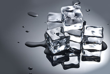 Image showing ice cube with water drops