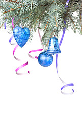 Image showing Christmas balls and decoration on fir tree branch isolated on wh