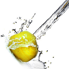 Image showing fresh water splash on yellow apple isolated on white