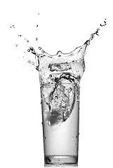 Image showing water splash in glass isolated on white