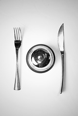 Image showing fork and knife on table with restaurant ring