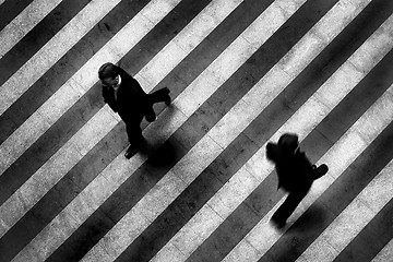 Image showing Busy crosswalk scene on the stripped floor