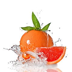 Image showing Water splash on grapefruit with mint isolated on white