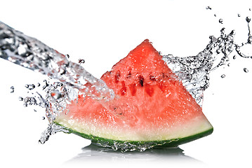 Image showing watermelon and water splash isolated on white