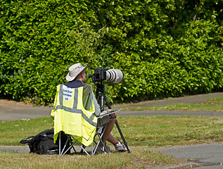 Image showing Photographer by roadside during triathlon