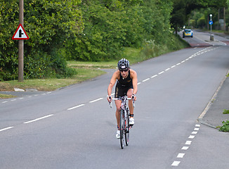 Image showing Woman Triathlete Cycling