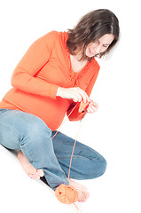 Image showing Portrait of pretty pregnant woman knitting