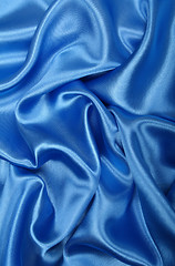 Image showing Smooth elegant blue silk as background 