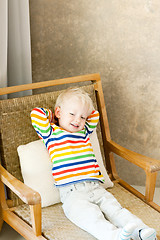 Image showing toddler lying in the chair