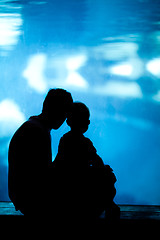 Image showing father and son in aquarium