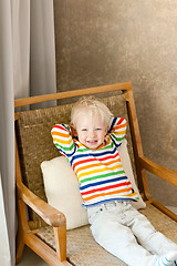 Image showing toddler lying in the chair