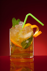 Image showing Glass of orange cocktail