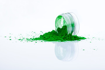 Image showing spilled green makeup powder