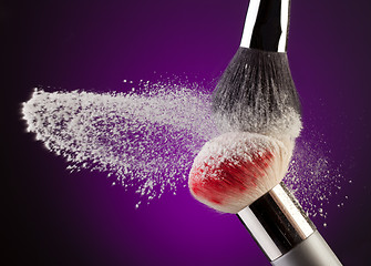 Image showing Makeup powder and brushes