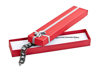 Image showing open red gift box with a necklace