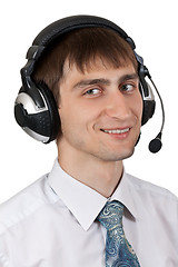 Image showing businessman in shirt and tie in the headphones