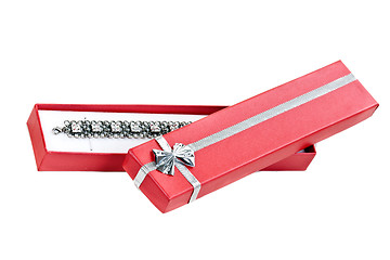 Image showing open red gift box with a necklace