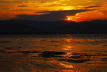 Image showing Sunrise on riverbank