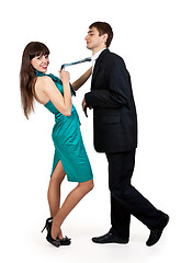 Image showing girl holds a businessman in tie