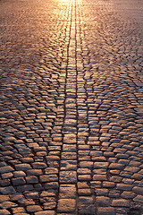 Image showing stone pavement in evening sunlight