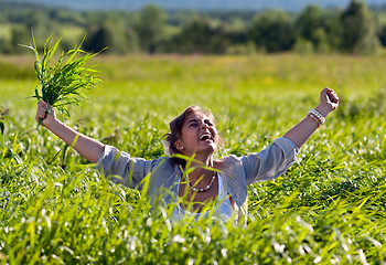 Image showing girl screaming in the grass