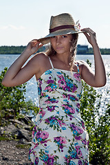 Image showing girl in a straw hat