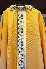 Image showing Catholic golden dress
