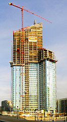 Image showing Sunny skyscraper construction