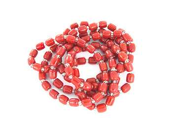 Image showing Rolled up red necklace