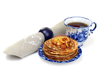 Image showing Pancakes with apple sauce isolated on a white background.