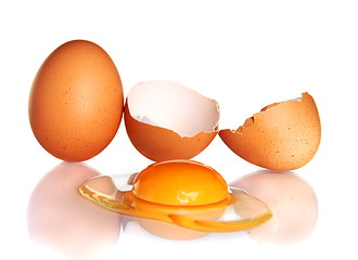 Image showing Egg and smashed an egg on a white background