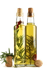 Image showing Olive oil with rosemary, garlic and pepper.