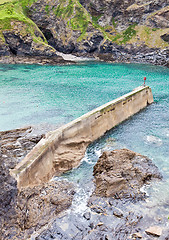 Image showing Vibrant detailed image of an old stone pier in Port Isaac, Cornw