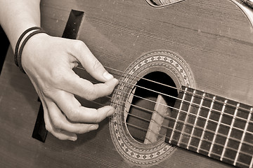 Image showing playing guitar