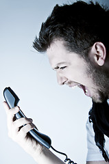 Image showing Man shouting on the phone