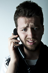 Image showing Young man on the phone