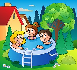 Image showing Garden with three kids in pool