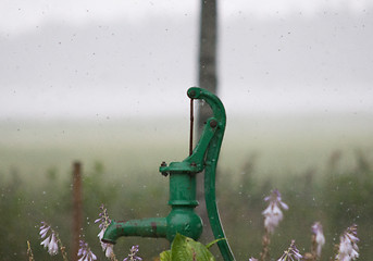 Image showing Waterpump in rain