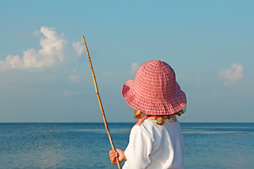 Image showing A little girl on the seashore