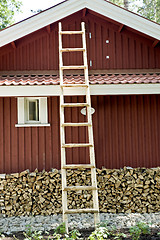 Image showing Red wooden house facade