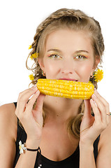 Image showing woman eating corn-cob