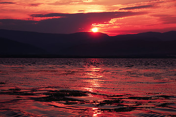 Image showing Sunrise on riverbank