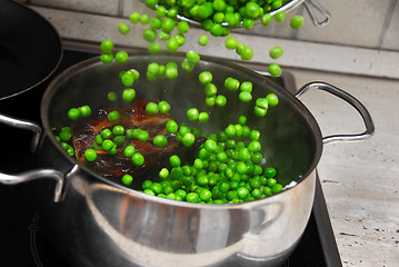 Image showing Cooking green peas