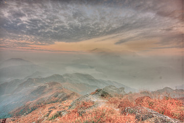 Image showing mountain sunset and colored sky with clouds 