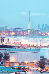 Image showing gas container and bridge at night