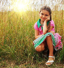 Image showing  little girl on the meadow