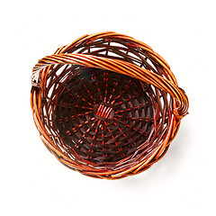 Image showing Handmade rattan basket on white background