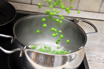 Image showing Cooking green peas